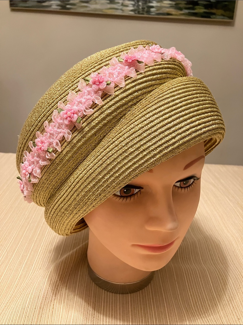 Elegant Metallic Gold Straw Hat with Pink Floral Trim